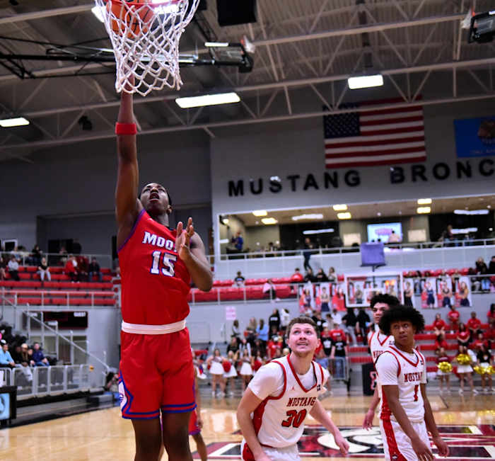 Moore senior Darian Grant (15) has been a major contributor for the Lions during their current 11-game winning streak as they start Class 6A postseason play.